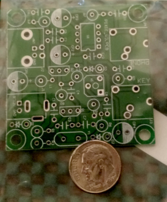 The Pixie circuit board with a dime for size-comparision